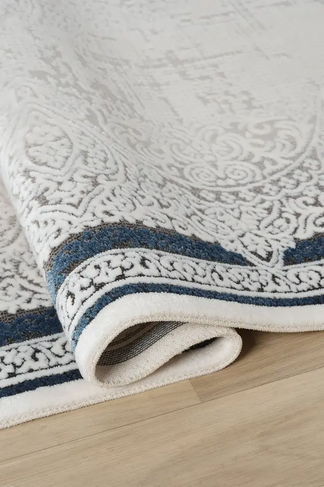 Seyran Halı Ahlat 7051 Mavi Akrilik Çerçeveli Dokuma Taban Saçaklı Modern Şık Halı