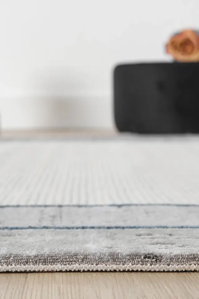 Seyran Halı Ahlat 7053 Mavi Akrilik Çerçeveli Dokuma Taban Saçaklı Modern Şık Halı